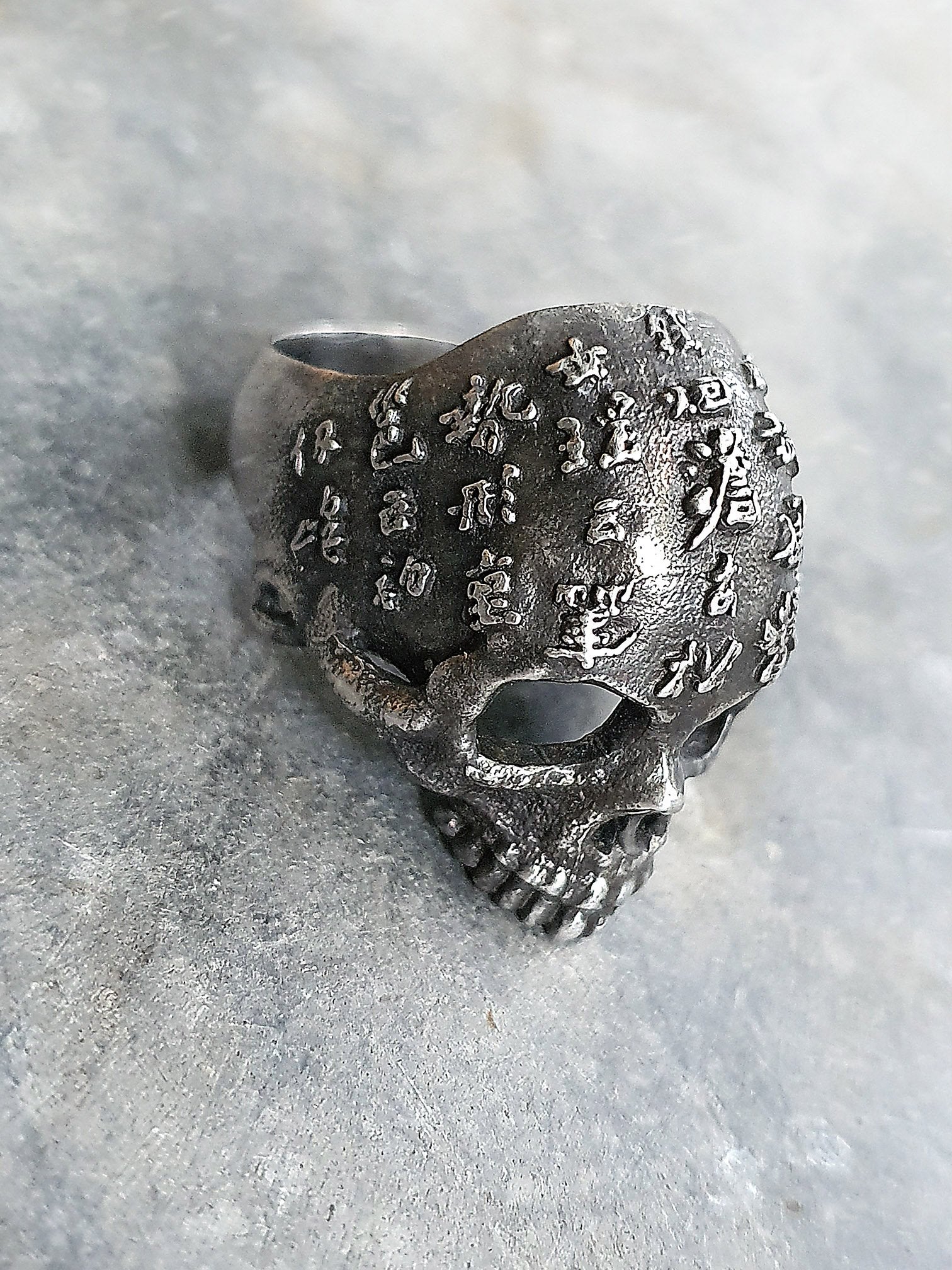 Skull Ring | Asian Scripture