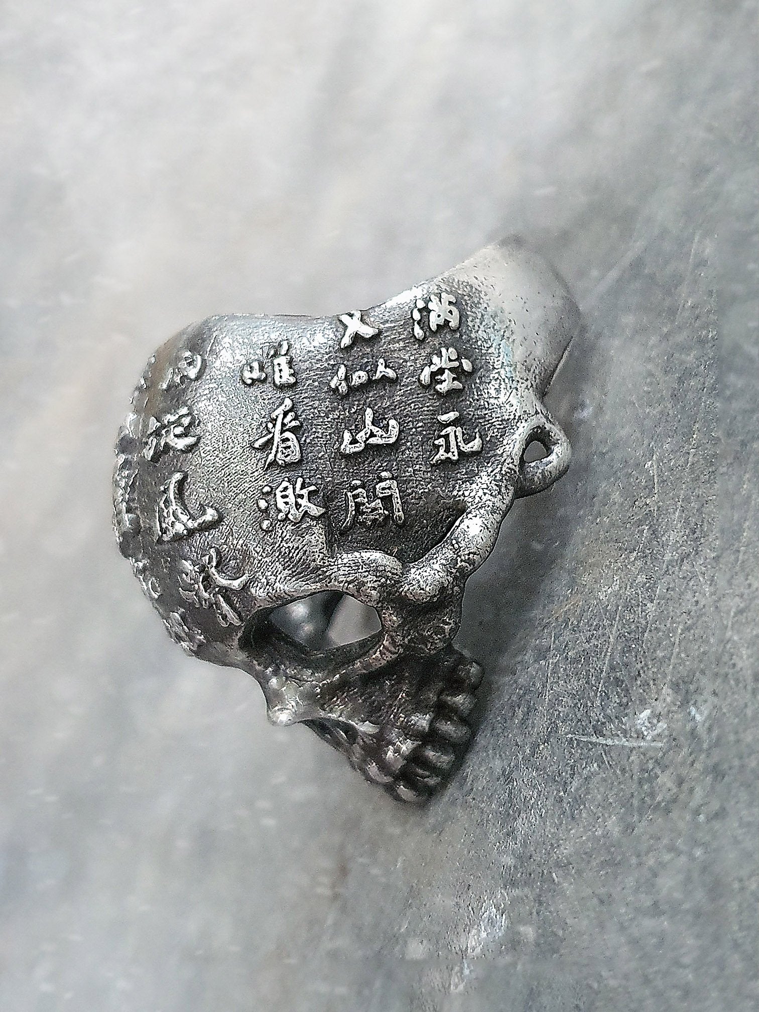 Skull Ring | Asian Scripture